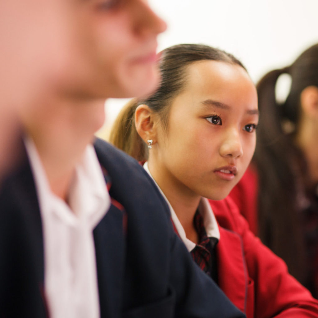 Senior female student in class