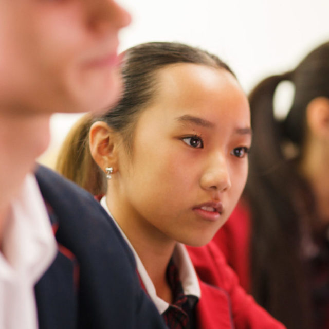 Senior female student in class