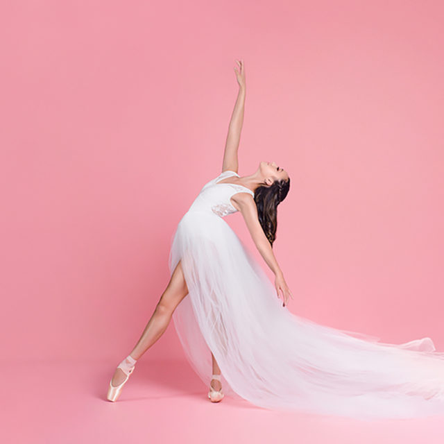 Sienna Micallef in staged ballet shoot wearing white flowy gown