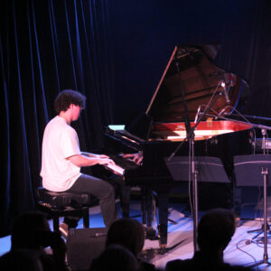 Leo Papa plays piano at McDonald College music showcase - Performing arts school