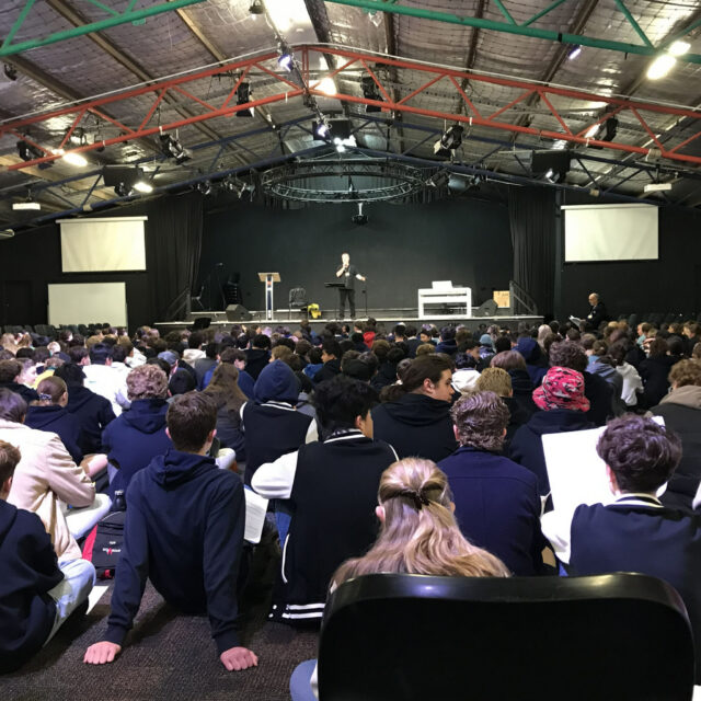 over 400 students massed choir rehearsal